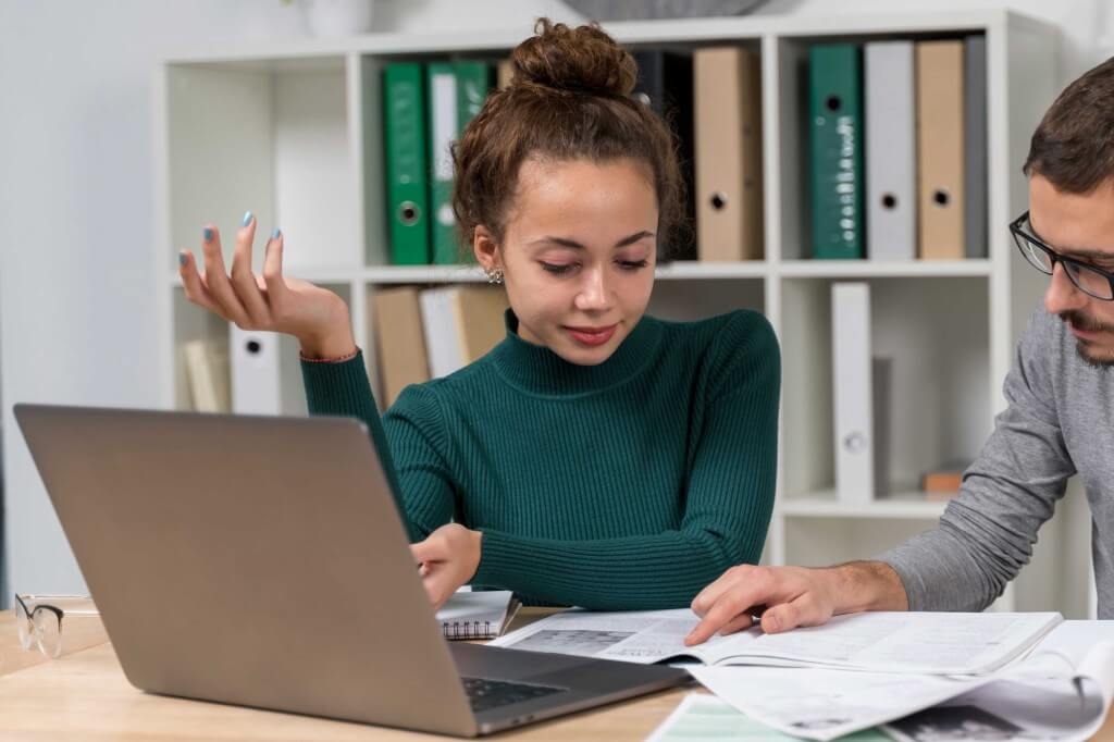 Two students discussing - Queen's Online School