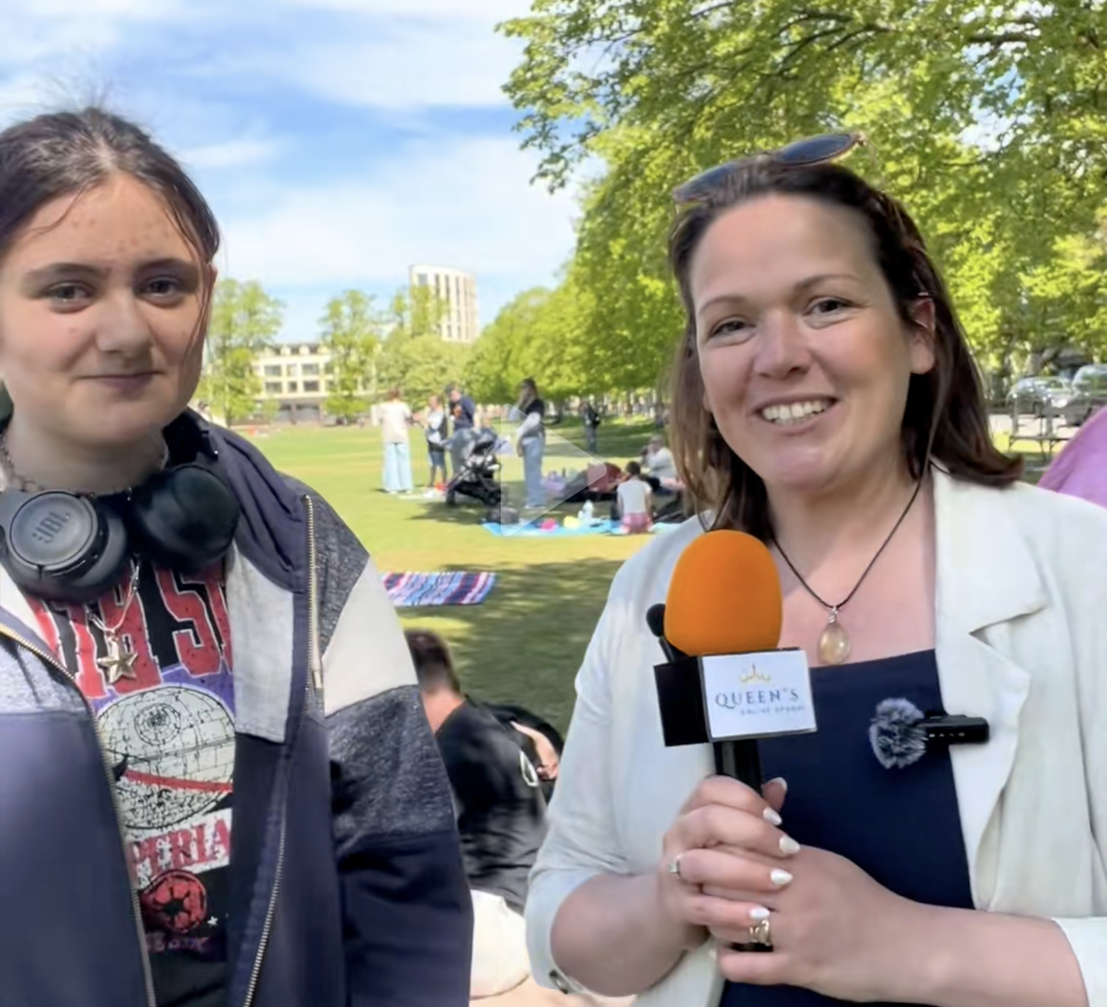 Queen's online school Head teacher speaking with a student