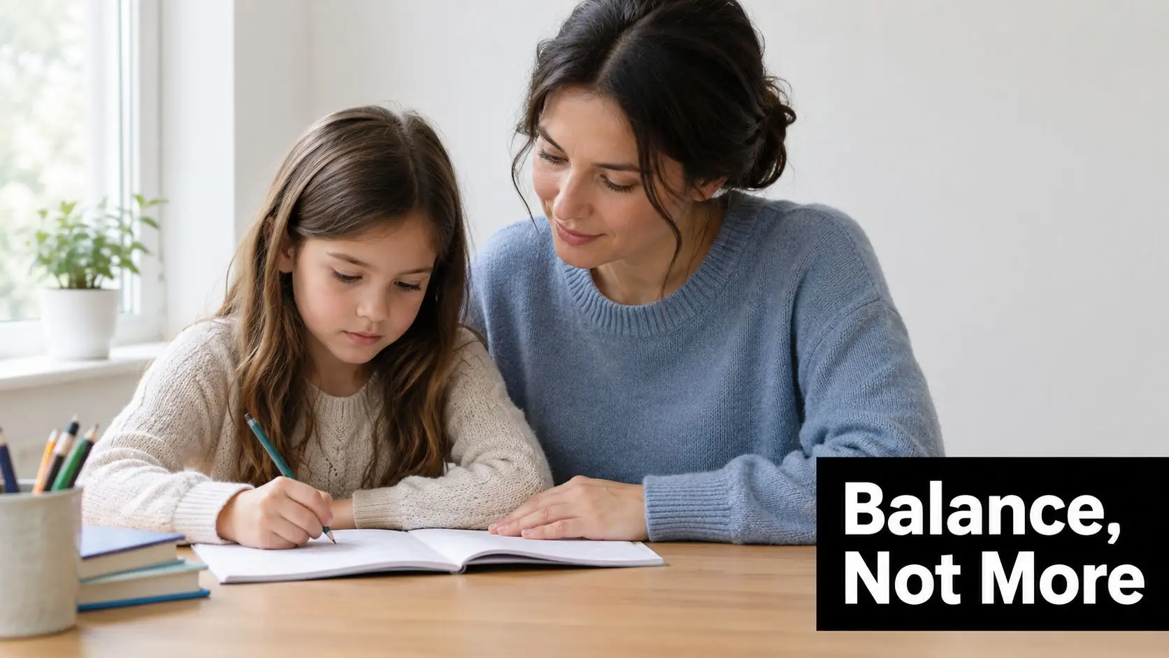 A woman helping a young girl with her schoolwork while sitting together at a wooden table.
